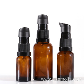 Empty glass amber cosmetic skincare cream pump bottle